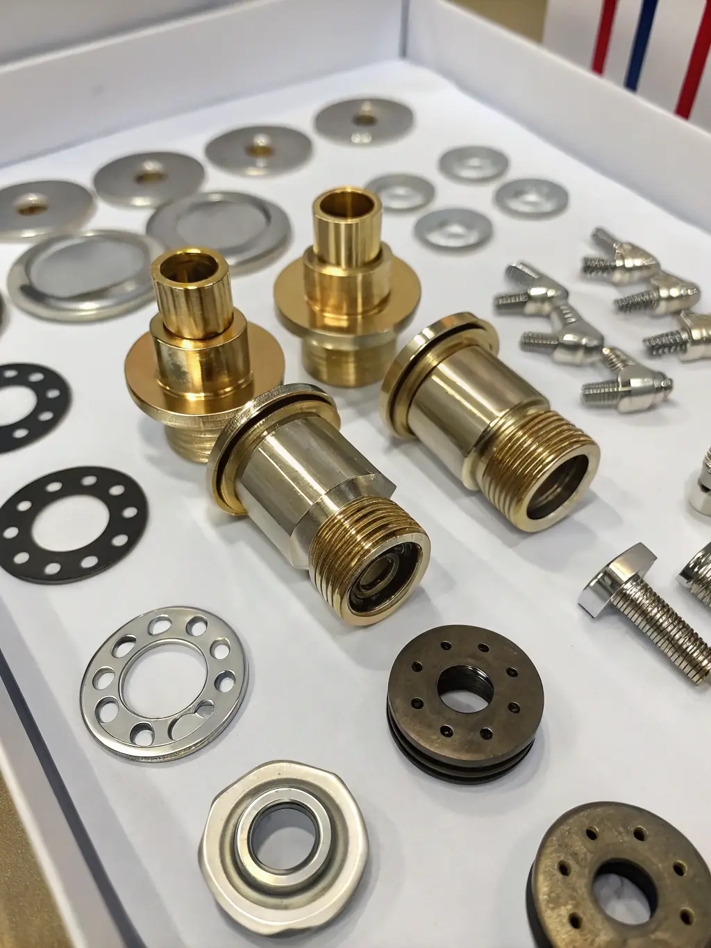 A variety of brass fittings and fixtures, emphasizing the importance of brass recycling and the services offered by ECM Recycling.